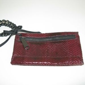 Rafe burgundy snakeskin wristlet/clutch